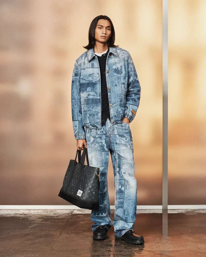 Louis Vuitton look featuring a graphic patchwork denim jacket and matching wide-leg jeans paired with a black monogram tote