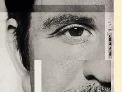 A fragmented black-and-white close-up portrait showing half of a man’s face layered with translucent rectangular overlays and collage-like interruptions. The composition focuses on a single eye, textured skin, and rough facial hair, while handwritten markings and abstract blocks create a distorted, editorial-style visual that feels introspective, experimental, and psychologically raw