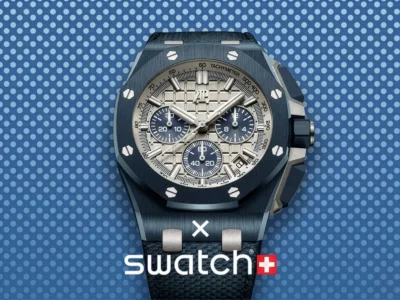Blue-toned render of a Swatch x Audemars Piguet “Royal Pop” concept watch inspired by the Royal Oak Chronograph with octagonal bezel, textured dial, and sporty integrated strap against a dotted blue background