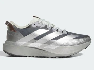Full lateral view of the adidas Star Wars Mandalorian & Grogu Adizero EVO SL ATR featuring reflective silver Three Stripes overlays, textured water-repellent toe protection, oversized Lightstrike Pro cushioning, and a muted grey palette inspired by Mandalorian beskar armor