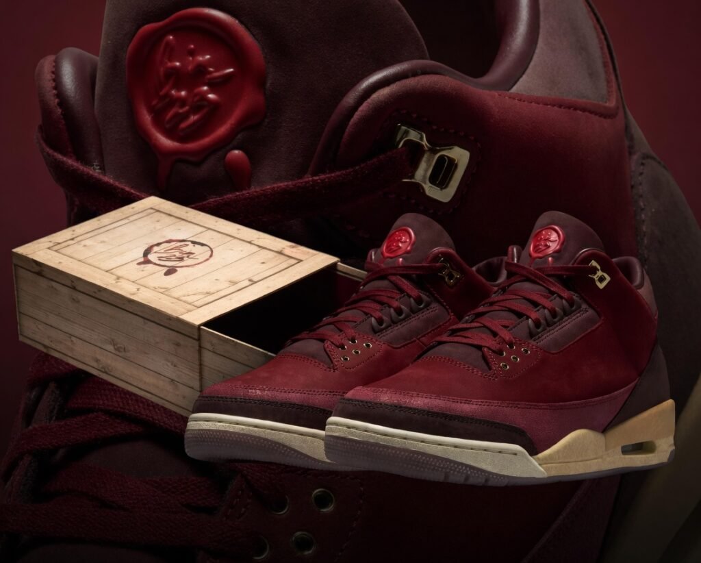 Jordan 3 Bin 23 – Premium suede in rich Team Red with elephant print overlays, gold accents, and wax seal branding. Comes with luxury wooden box packaging. Ultra-limited 2026 release. Pure collector heat