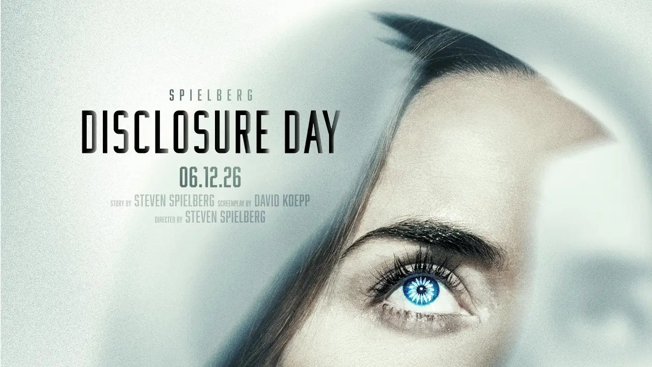 Promotional poster for Disclosure Day featuring a close-up of a woman’s face with a glowing blue eye effect alongside the film title and theatrical release date in a minimalist science-fiction design