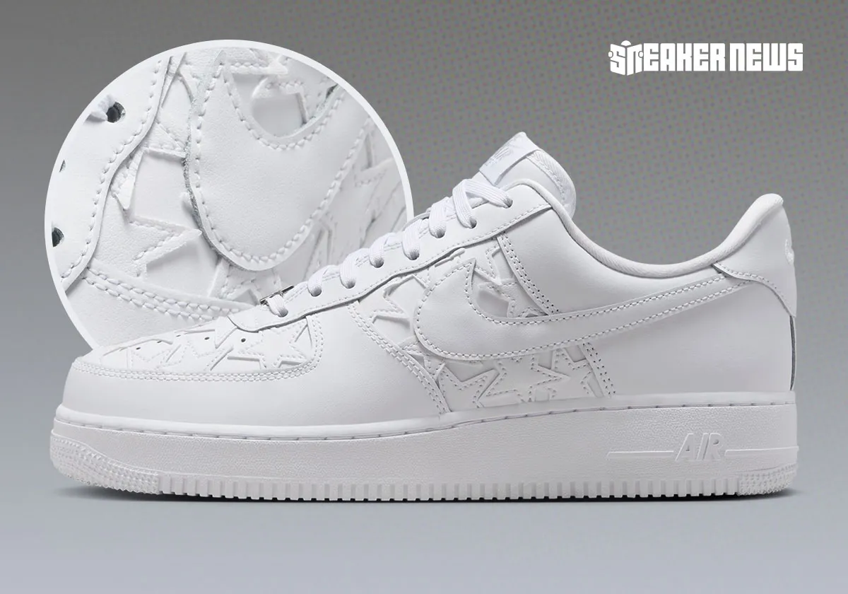 Side profile of the Nike Air Force 1 Low “White Stars” featuring tonal white leather construction, embossed star-shaped overlays beneath the Swoosh, and classic Air Force 1 tooling, with an inset close-up highlighting the textured star detailing across the upper