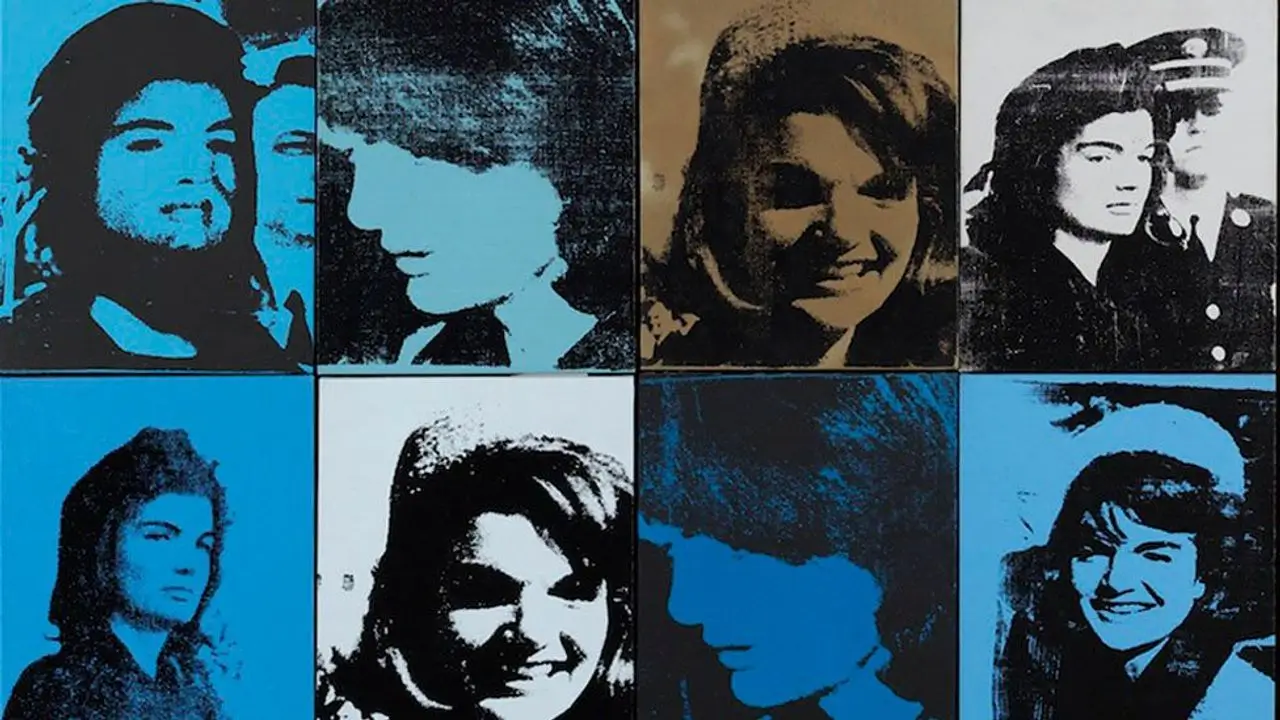 A multi-panel Pop Art composition featuring repeated and fragmented photographic portraits of Jacqueline Kennedy rendered in stark blue, black, white, and muted sepia tones. Arranged in a grid structure, each panel presents a different emotional register and photographic moment, shifting between smiling public appearances, obscured silhouettes, solemn close-ups, and heavily contrasted funeral imagery. The silkscreen textures appear distressed and uneven, with visible ink inconsistencies and grainy halftone surfaces that evoke newspaper reproduction and mechanical print transfer.The alternating imagery creates a psychological rhythm between glamour and mourning, celebrity and disappearance. Some portraits remain sharply legible, while others dissolve into shadow or abstraction, suggesting the instability of memory under constant media circulation. The repeated use of cyan-blue backgrounds intensifies the emotional coldness of the composition, contrasting against darker black fields that feel heavy, funereal, and archival.Visually, the work aligns with Andy Warhol’s broader Jackie series from the mid-1960s, where Jacqueline Kennedy became both cultural icon and vessel for collective national grief following the assassination of President John F. Kennedy. Rather than presenting a singular portrait, the composition fragments identity across multiple reproductions, transforming media imagery into a meditation on repetition, public spectacle, and emotional desensitization. The result exists between celebrity portraiture and historical document, where seriality itself becomes the emotional language of the work