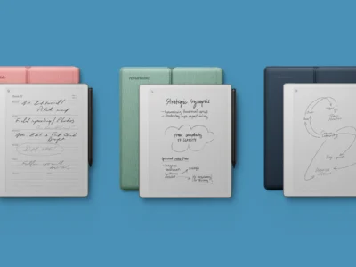 Three reMarkable Paper Pure E Ink tablets displayed against a bright blue background with pastel folio covers in pink, green, and navy, each showing handwritten notes and diagrams alongside attached black styluses