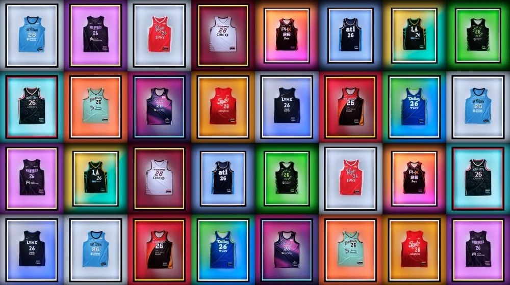 Grid collage showcasing multiple 2026 WNBA Nike Rebel Edition jerseys displayed in illuminated colorful frames, featuring teams including the New York Liberty, Seattle Storm, Atlanta Dream, Phoenix Mercury, Los Angeles Sparks, Minnesota Lynx, Dallas Wings, Golden State Valkyries, and Toronto Tempo