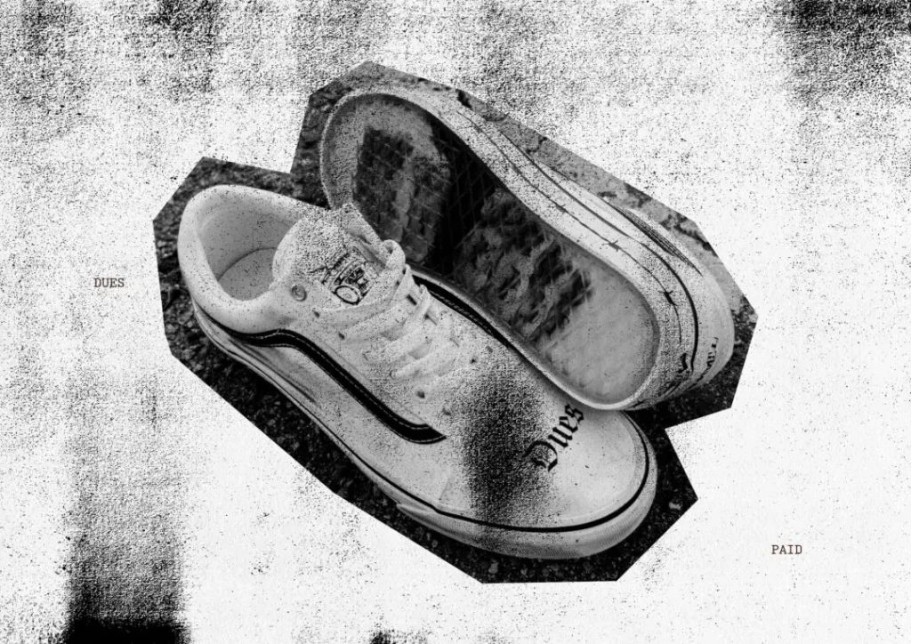 Editorial black-and-white composition featuring the Old Skool sneaker pair with visible outsole artwork and “Dues Paid” theme