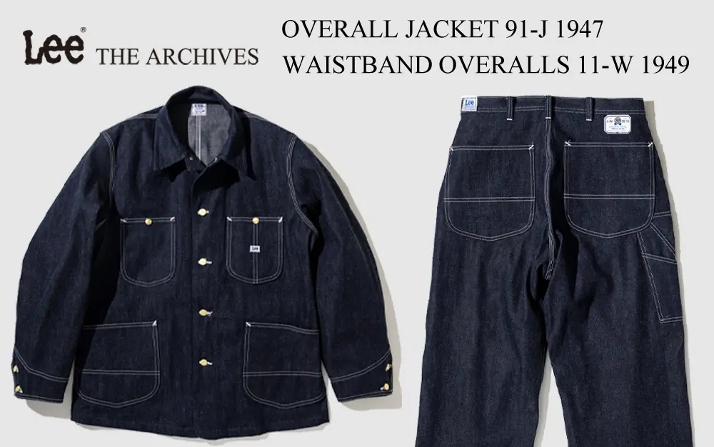 Lee THE ARCHIVES 91-J 1947 Overall Jacket and 11-W 1949 Waistband Overalls displayed side by side in raw indigo denim. The coverall jacket features a classic workwear silhouette with four patch pockets, contrast white stitching, brass buttons, and vintage Lee branding. Beside it, the matching 11-W 1949 waistband overalls are shown from the rear, highlighting oversized utility pockets, hammer loop, contrast stitching, and heritage Lee labels. Promotional graphic introducing two archival reproductions inspired by postwar American workwear.