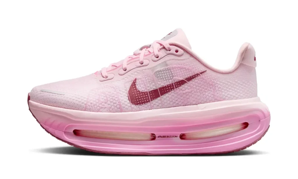 Lateral profile view of the Nike Vomero Premium in Pearl Pink showcasing the large visible Air Zoom unit and layered midsole