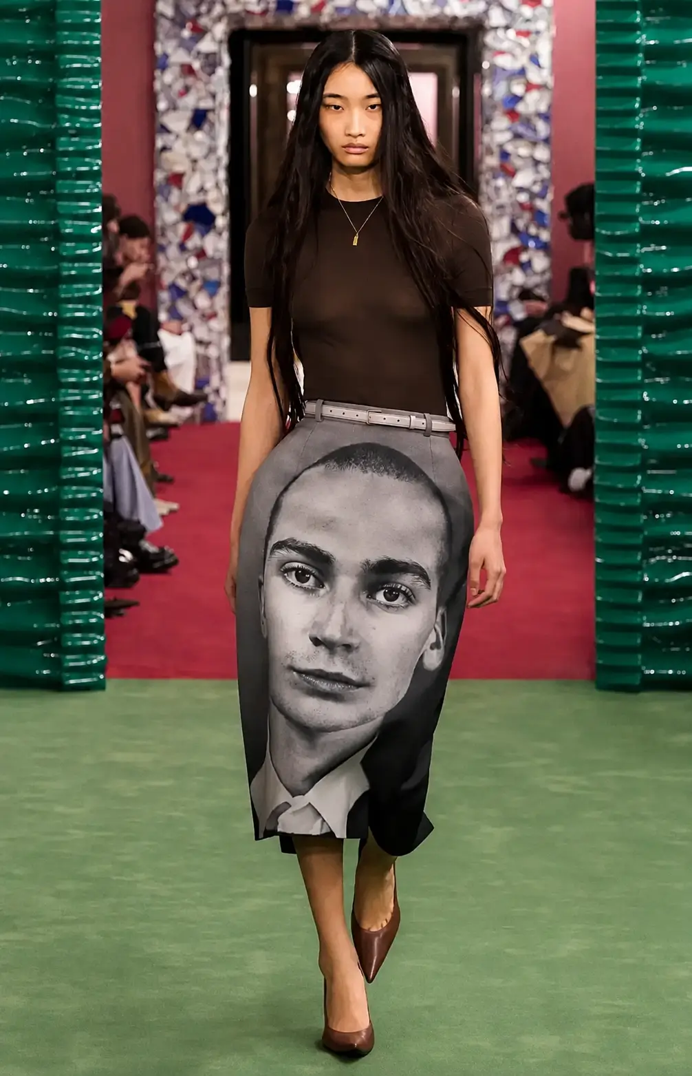 Acne Studios Fall 2026 runway look featuring Paul Kooiker portrait print on pencil skirt – inspiration for Michelle Obama’s custom Marian Robinson tribute at Obama Center