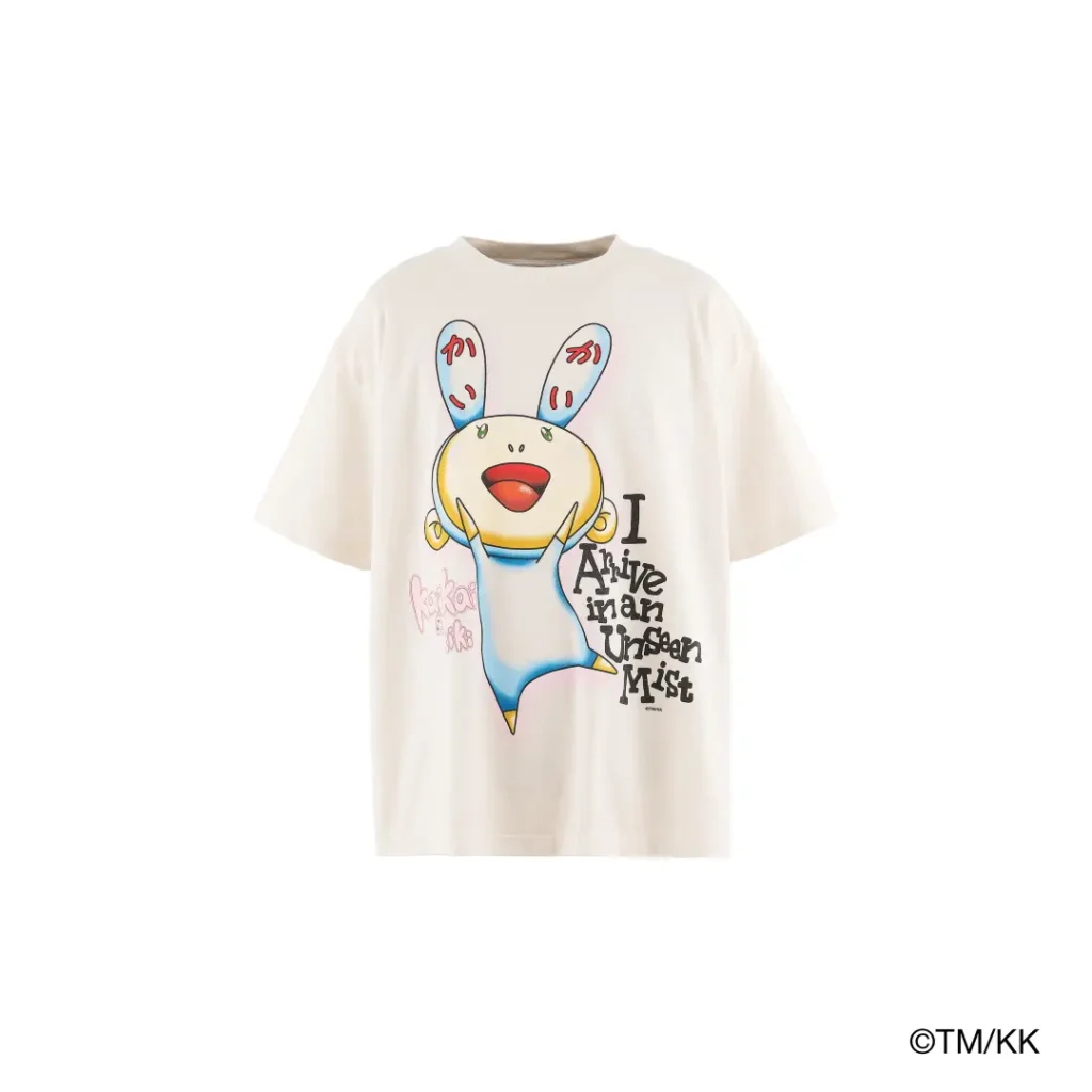 Front product image of an oversized white T-shirt featuring a large cartoon rabbit graphic and handwritten-style typography. The playful artwork dominates the relaxed sil