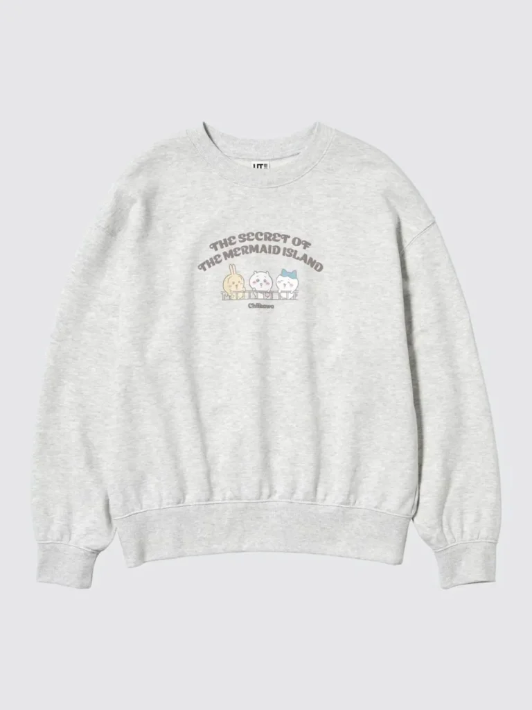 Heather gray UNIQLO UT Chiikawa crewneck sweatshirt featuring The Secret of the Mermaid Island title above three main characters in a soft pastel front graphic