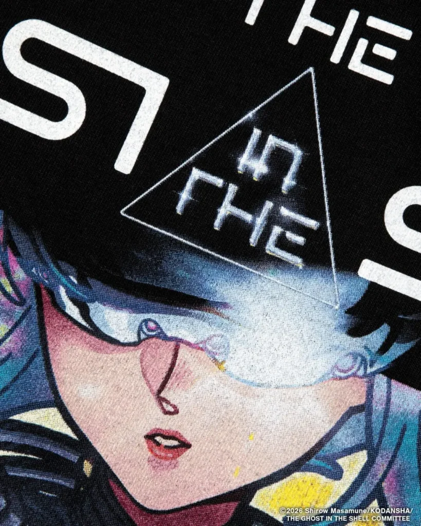 Detailed crop of the character’s face featuring a futuristic visor obscuring the eyes. Metallic highlights, blue hair strands, and cyberpunk-inspired illustration techniques are clear view