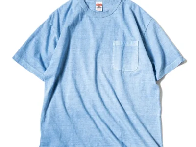 Washed light blue Healthknit HIGH! STANDARD pocket T-shirt displayed against a clean white background. The heavyweight cotton tee features a relaxed fit, ribbed crewneck, chest pocket, and subtle faded finish for a vintage day look