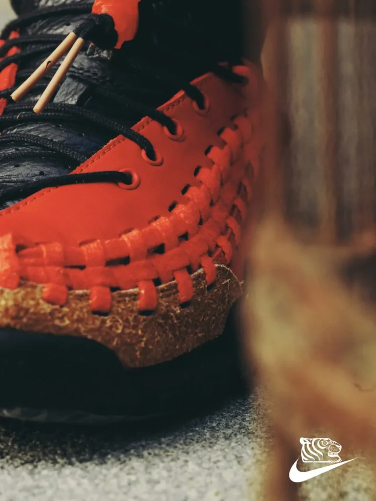 SOULGOODS x Nike Homescape Woven SP Chile Red HM6961-600 worn with cuffed jeans, showcasing red woven upper, black mid panel, and rugged black outsole