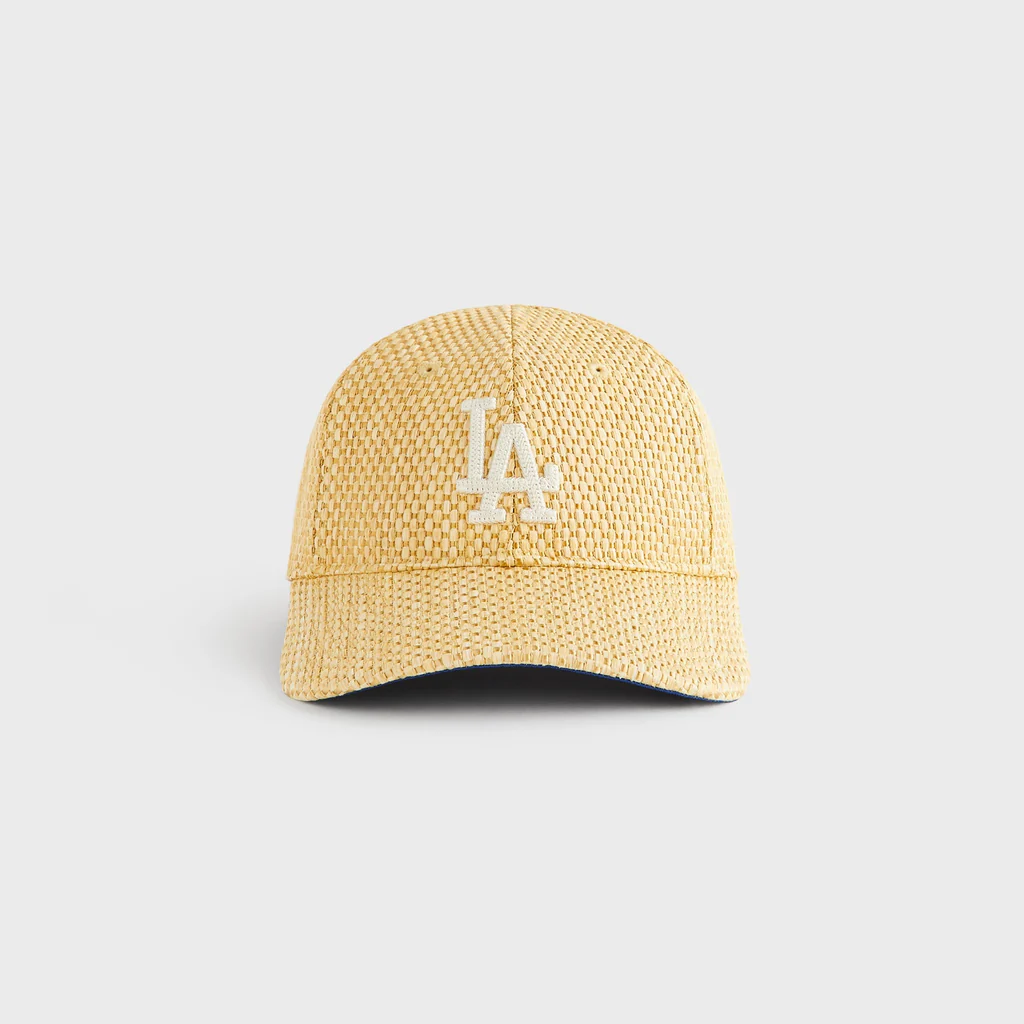 Front-facing Los Angeles Dodgers raffia cap featuring a tonal embroidered LA logo, straw-inspired woven upper, and classic curved-brim sil