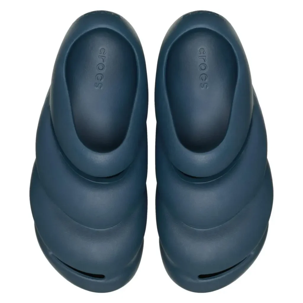 Top-down view of the Crocs THE ROY "Nightfall" revealing its minimalist slip-on opening, contoured footbed, sculpted foam upper, and subtle ventilation details near the toe
