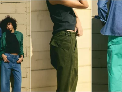 Models pose against a weathered wooden wall wearing relaxed-fit workwear from Saturdays NYC, featuring washed denim shirts, wide-leg jeans, and vibrant mint-green carpenter pant