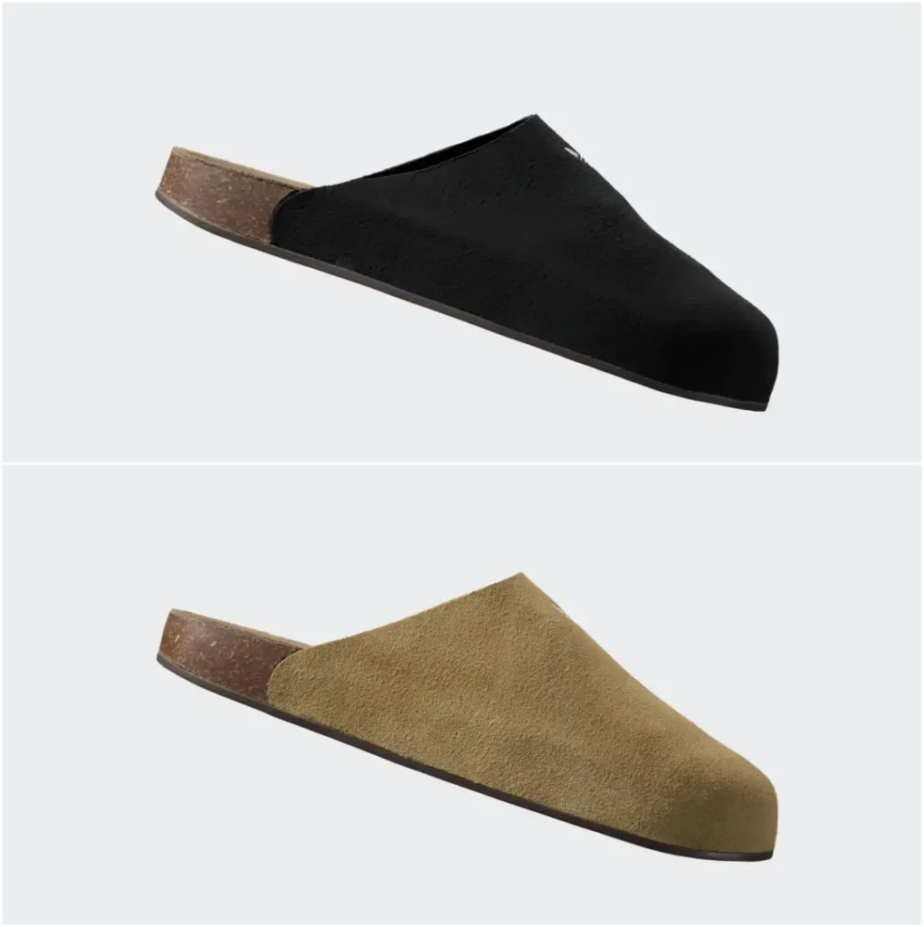 Beige adidas mule slippers featuring a soft suede-textured upper and embossed Trefoil logo, shown being worn indoors