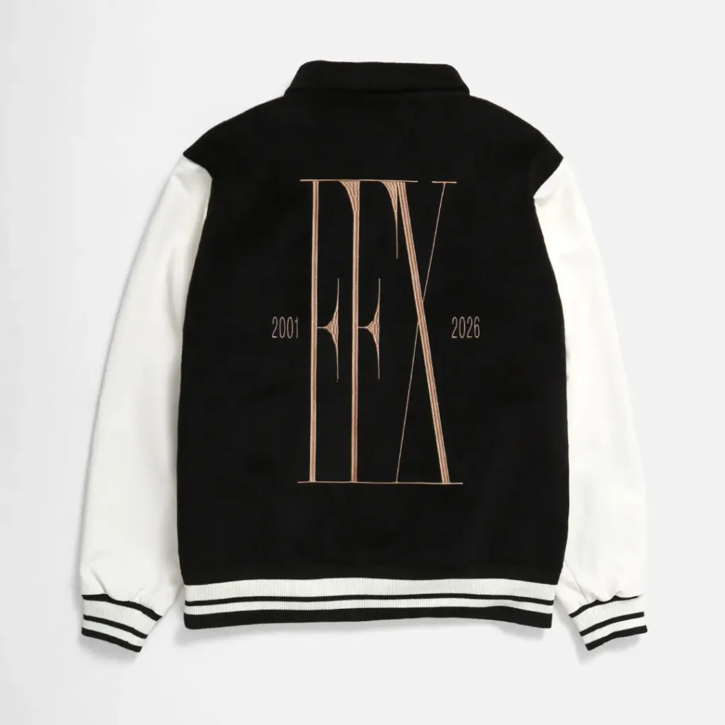 Black-and-white varsity jacket with striped ribbed trim and an oversized Final Fantasy X anniversary logo embroidered across the back, accompanied by the years 2001 and 2026