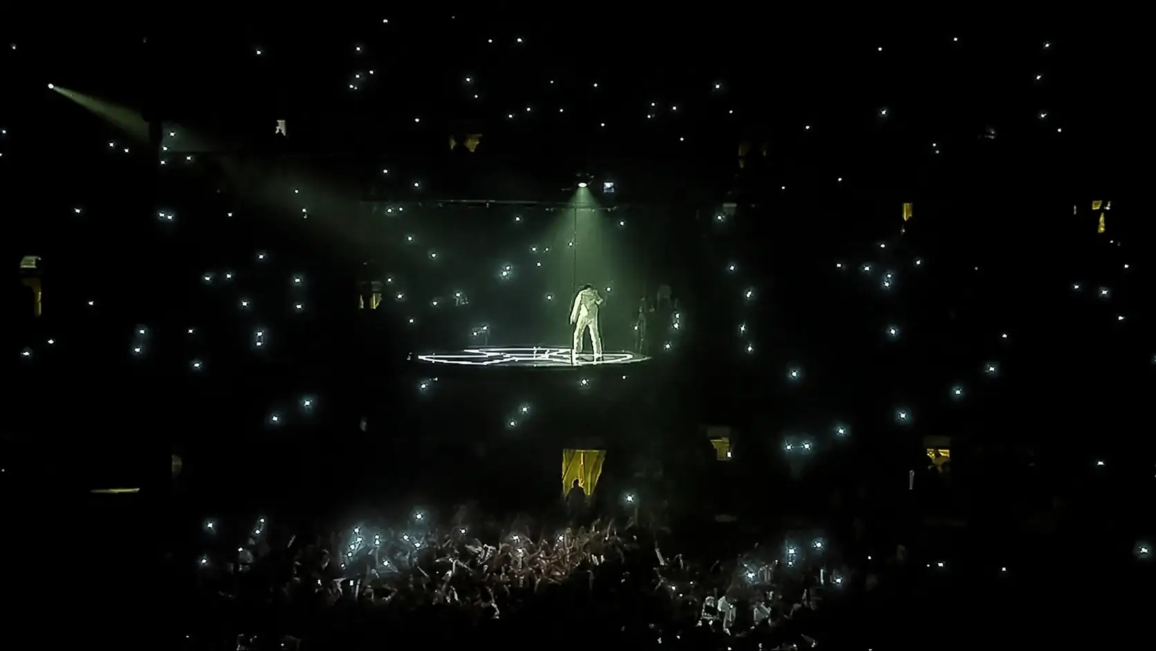 Don Toliver performs on a floating stage above a packed crowd at Madison Square Garden during the Octane Tour stop in New York City
