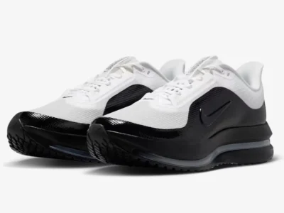 Nike Pegasus Premium in White/Black colorway featuring a white nylon mesh upper, glossy black overlays, and a full-length Air Zoom cushioning unit