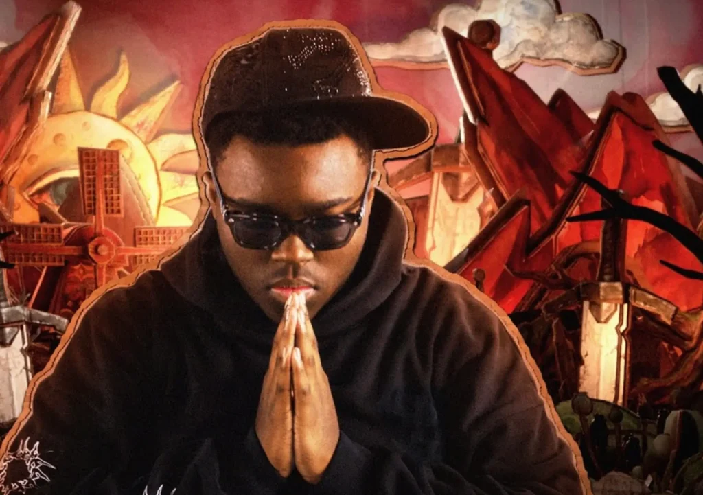 Slayr in signature sunglasses and black hoodie, hands in prayer pose, against dramatic red-hued BloodLuxe backdrop with swords and surreal architecture — official visual from “Eyesight” track