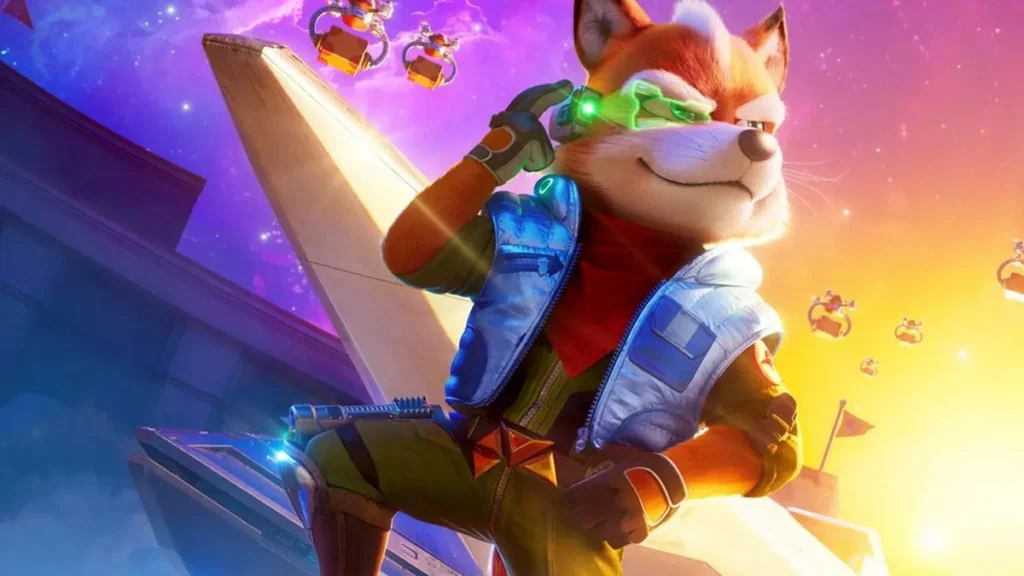 Promotional artwork of Fox McCloud from Star Fox Zero standing confidently on an elevated platform. Wearing a blue pilot jacket and green communications visor, he is surrounded by vibrant cosmic colors and distant enemy craft in a dynamic sci-fi set