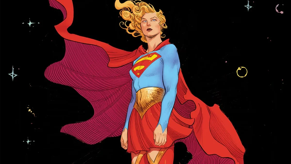 Classic comic cover of Supergirl: Woman of Tomorrow. Flowing cape and determined gaze in cosmic space — the source inspiration for Milly Alcock’s rebellious 2026 DCU film. Pure heroic energy