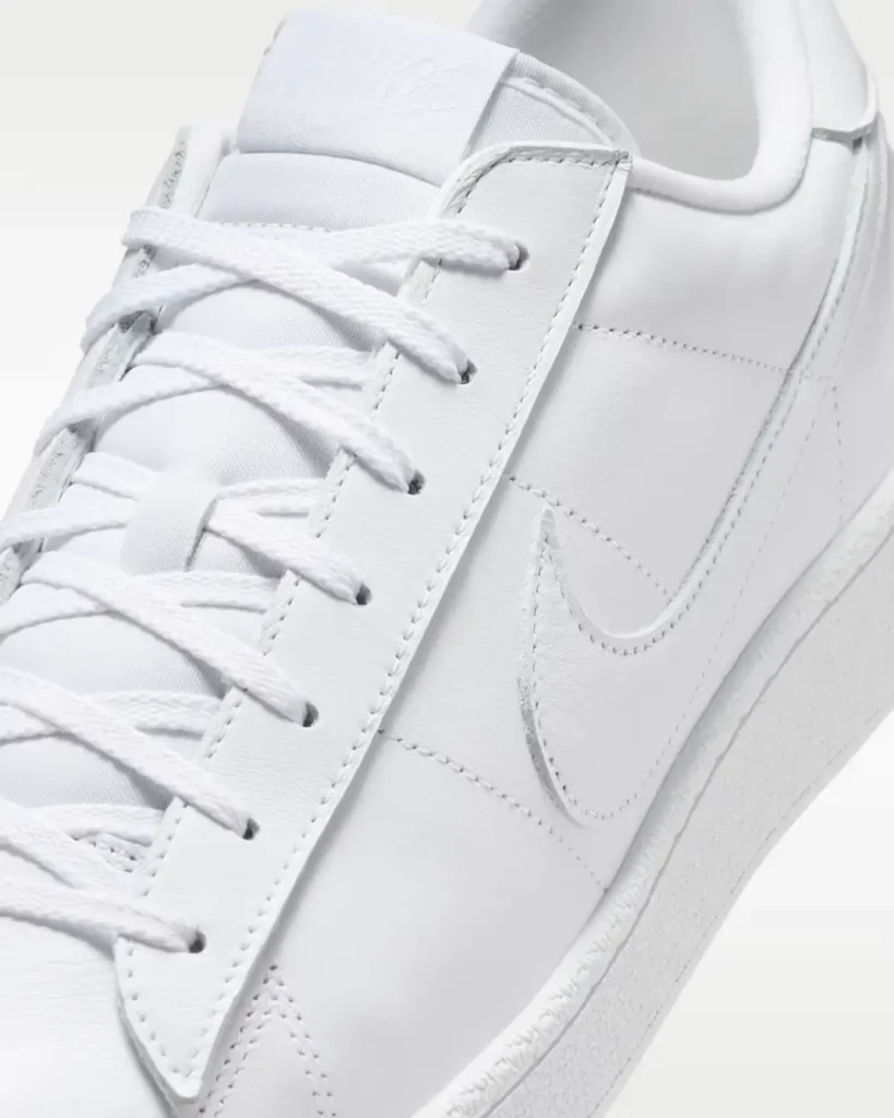 Close-up detail of the Nike Tennis Classic CS showcasing premium white leather panels, tonal stitching, and a clean Swoosh application