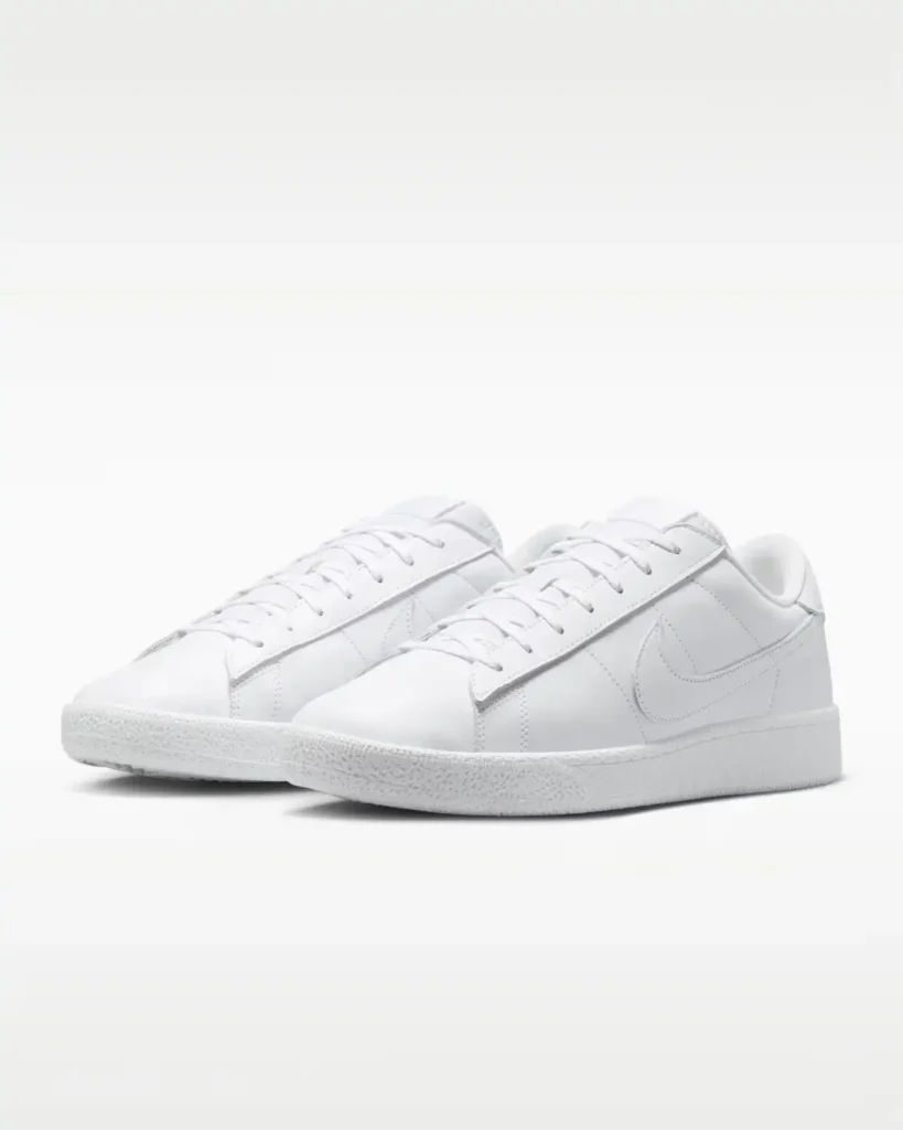 Angled pair shot of the Nike Tennis Classic CS Triple White emphasizing its timeless court-inspired silhouette and minimalist aesthetic