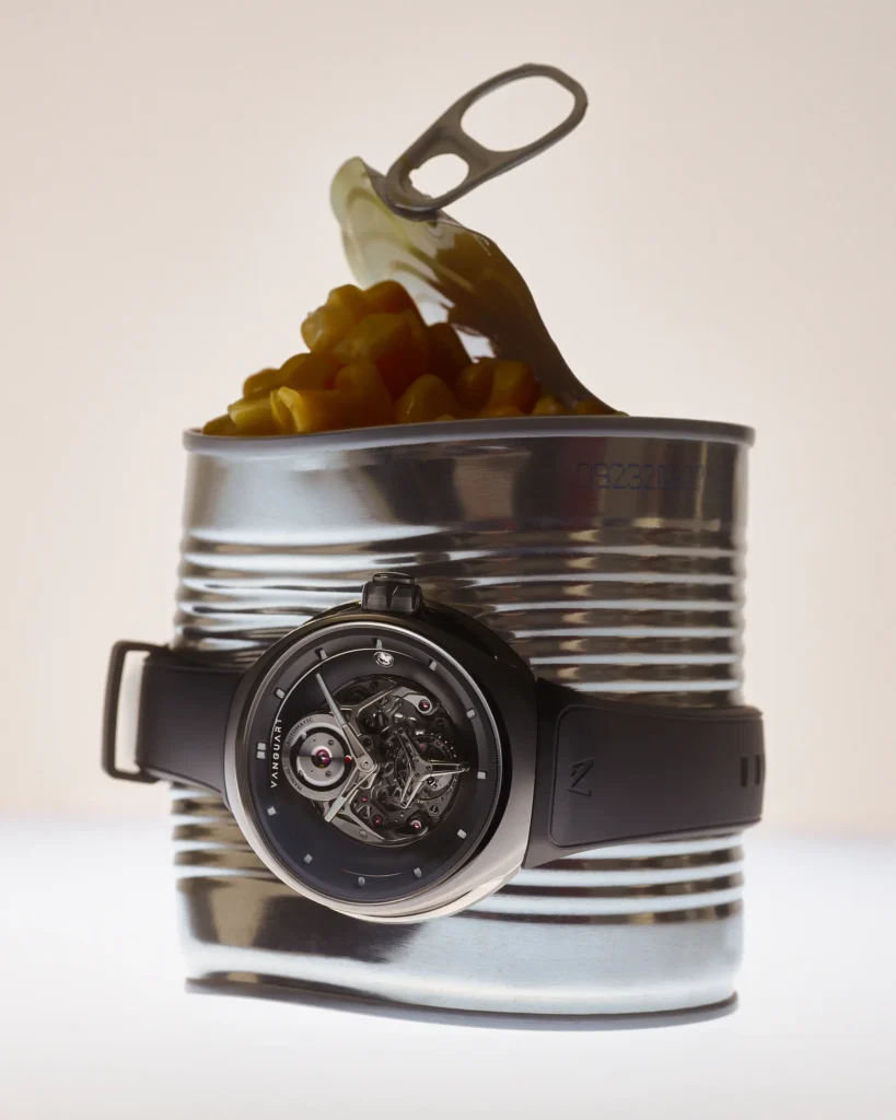 Vanguart watch secured around an opened tin can filled with pasta. The industrial metal surface contrasts with the refined mechanical craftsman of the watch