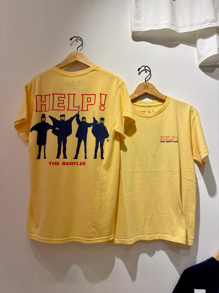 Yellow Beatles Help! T-shirt featuring the iconic band silhouette graphic on the back and subtle album logo embroidery on the chest