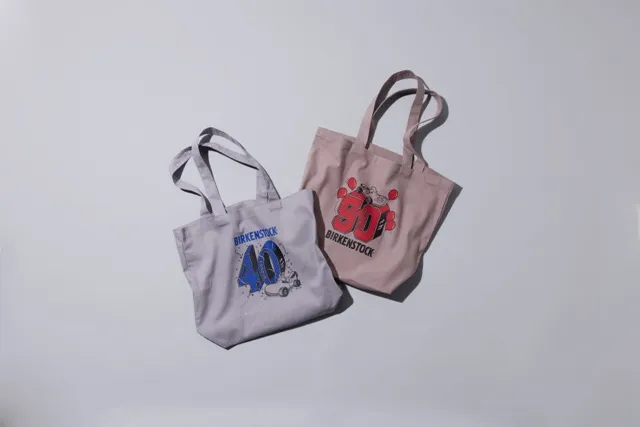 Exclusive tote bags created for the Shibuya opening feature playful anniversary-inspired graphics and Birkenstock branding. Designed as collectible keepsakes, they celebrate the store launch while reflecting the brand’s commitment to functionality and sustainable