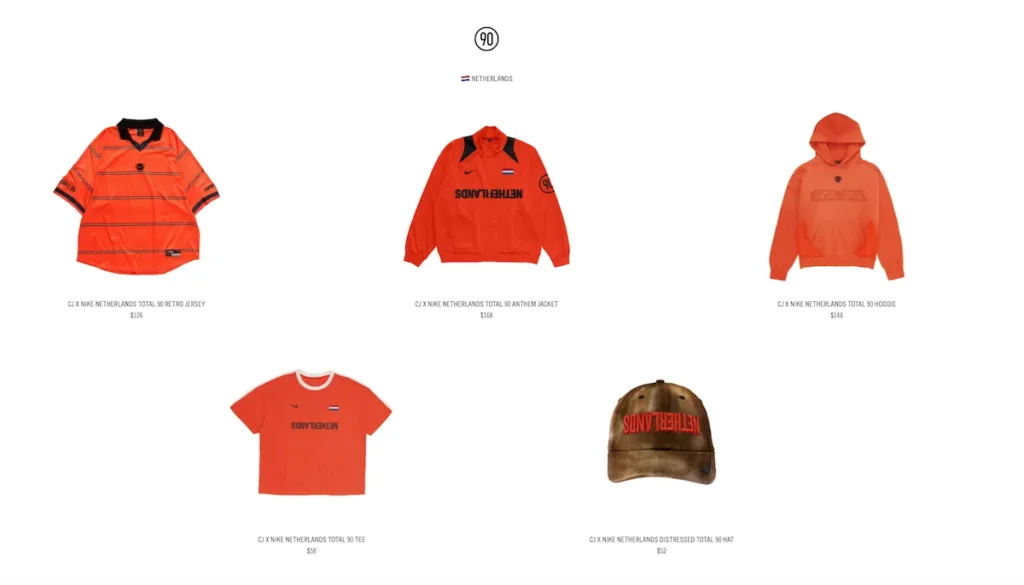 Bright orange Netherlands Total 90 capsule from Cactus Jack and Nike featuring a striped retro football jersey, orange anthem jacket with inverted “NETHERLANDS” text, matching orange hoodie, orange training T-shirt, and distressed brown cap with orange embroidery