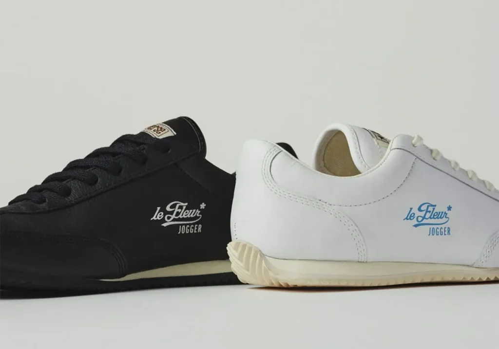 Side-by-side view of black and white Converse le FLEUR* Jogger sneakers highlighting contrasting colorways and matching retro runner construction