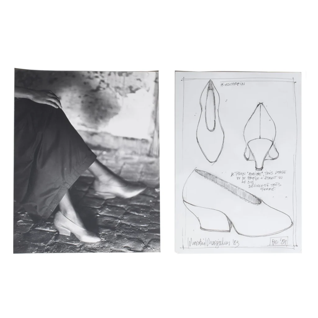 Black-and-white archival photograph of minimalist leather pumps displayed beside an original hand-drawn footwear design sketch with handwritten construction notes and proportion