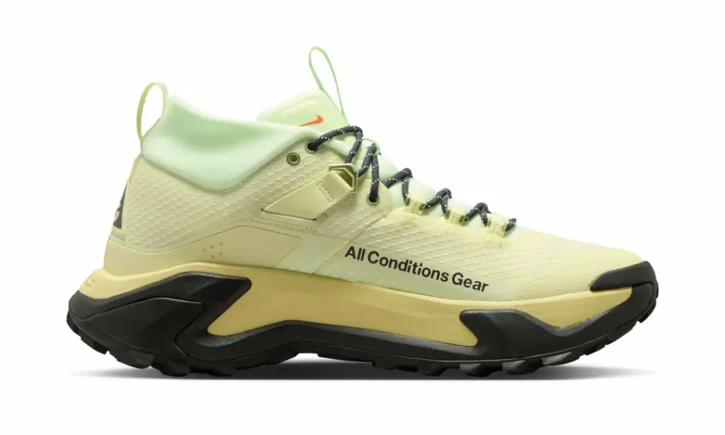 Medial profile of the pale volt Nike ACG Zegama Hike featuring bold 'All Conditions Gear' branding, supportive midsole geometry, and trail-ready construction