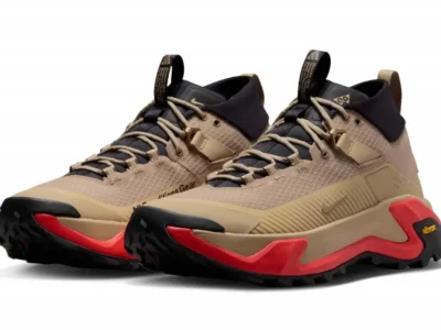 Three-quarter front view of the Nike ACG Zegama Hike pair highlighting the rugged toe protection, textured upper, and Vibram-equipped trail outsole