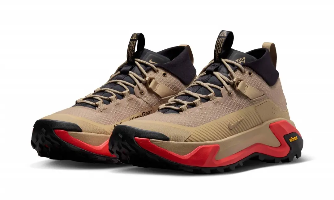 Three-quarter front view of the Nike ACG Zegama Hike pair highlighting the rugged toe protection, textured upper, and Vibram-equipped trail outsole