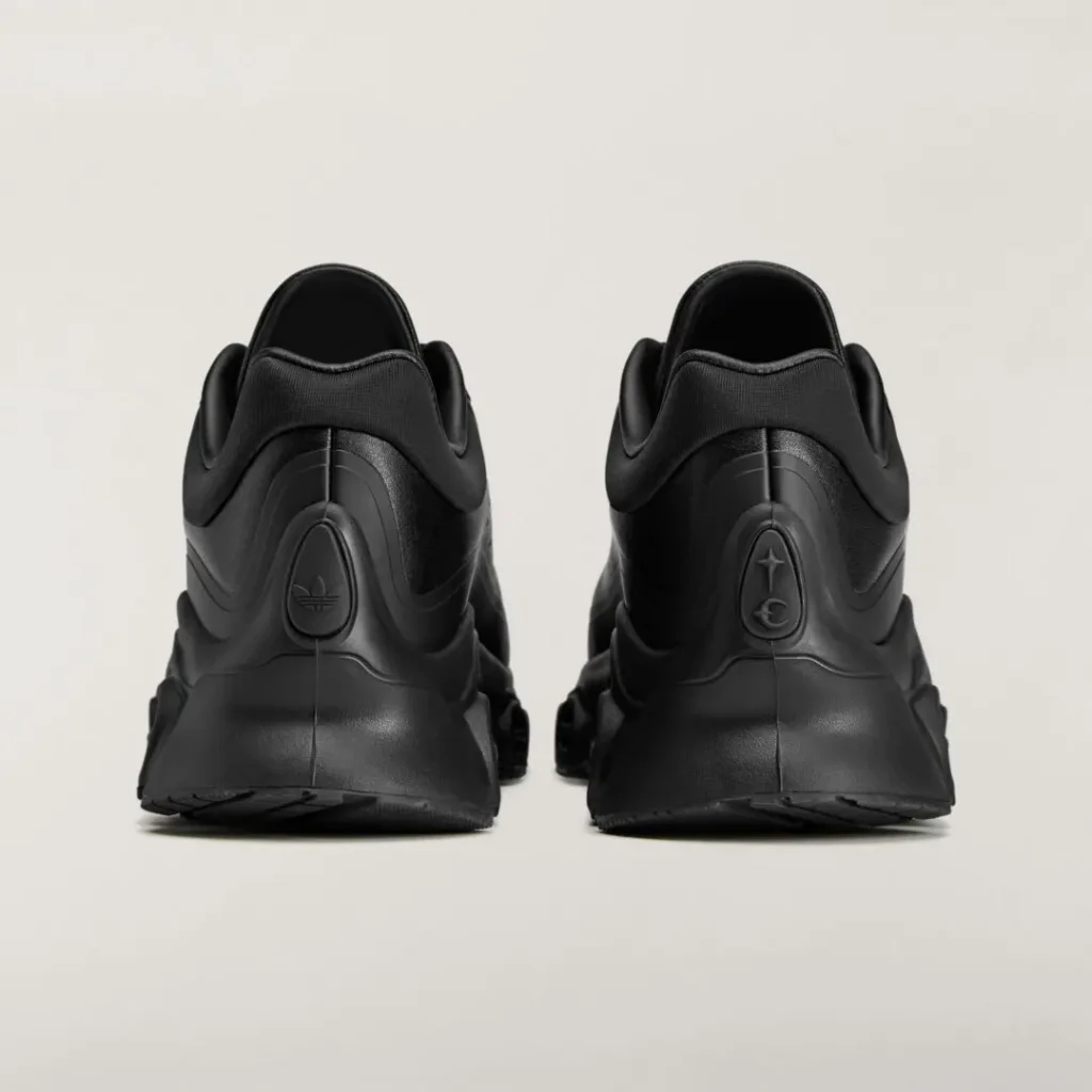 Rear view of the adidas Originals by Taqwa Bint Ali Megaride S2 with sculpted heel detailing and tonal brand