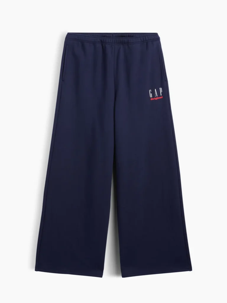 Navy GAP Original wide-leg sweatpants with an elastic waistband, side pockets, straight hems, and a small white-and-red logo on the upper left leg