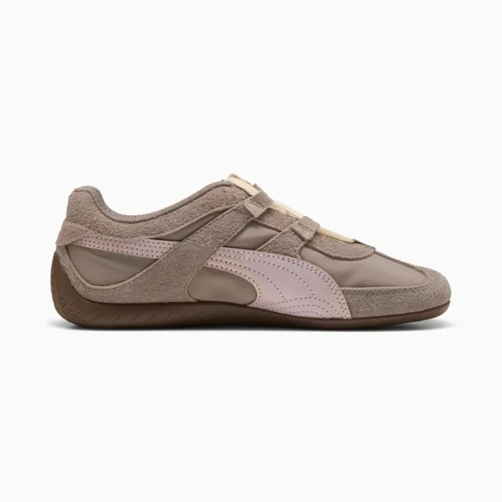 Opposite side profile displaying the layered suede construction, open midfoot cutout, pale pink Formstrip, and low-profile brown outsole