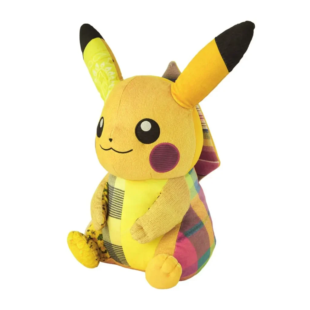 Sean Wotherspoon × Pokémon Center Pikachu plush crafted from colorful patchwork fabrics, featuring plaid, corduroy, knit, and floral textile panels with asymmetrical patterns that create a handmade, upcycled show