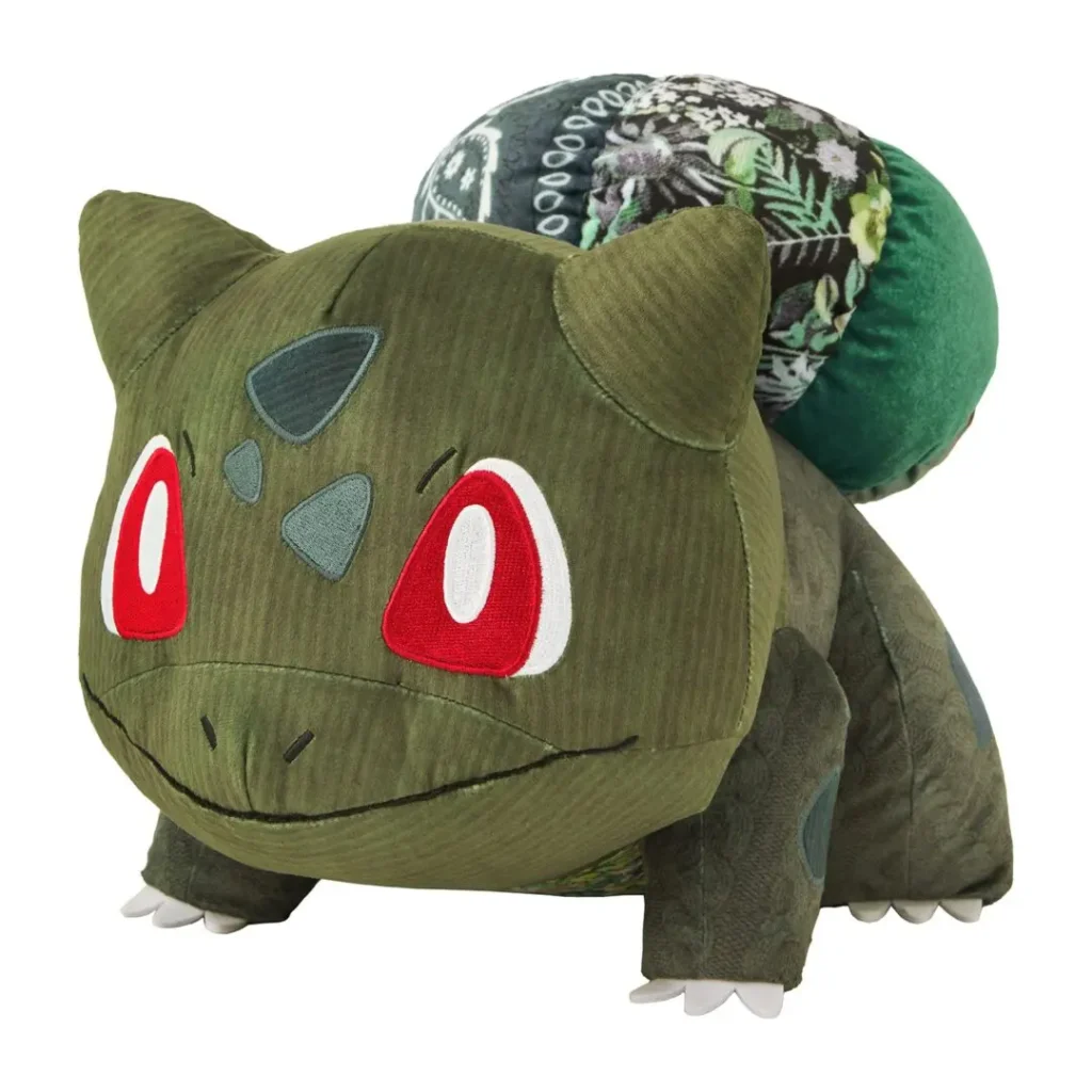 Sean Wotherspoon × Pokémon Center Bulbasaur plush finished in olive green corduroy with a patchwork bulb combining floral, paisley, and velvet fabrics, highlighting the collection's vintage-inspired mixed-material construction