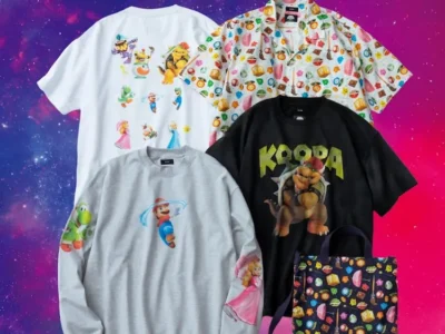 Promotional image showcasing the BEAMS collude inspired by The Super Mario Galaxy Movie, featuring graphic Tee, printed camp shirts, sweatshirts, and patterned tote bags displayed against a colorful galaxy backdrop