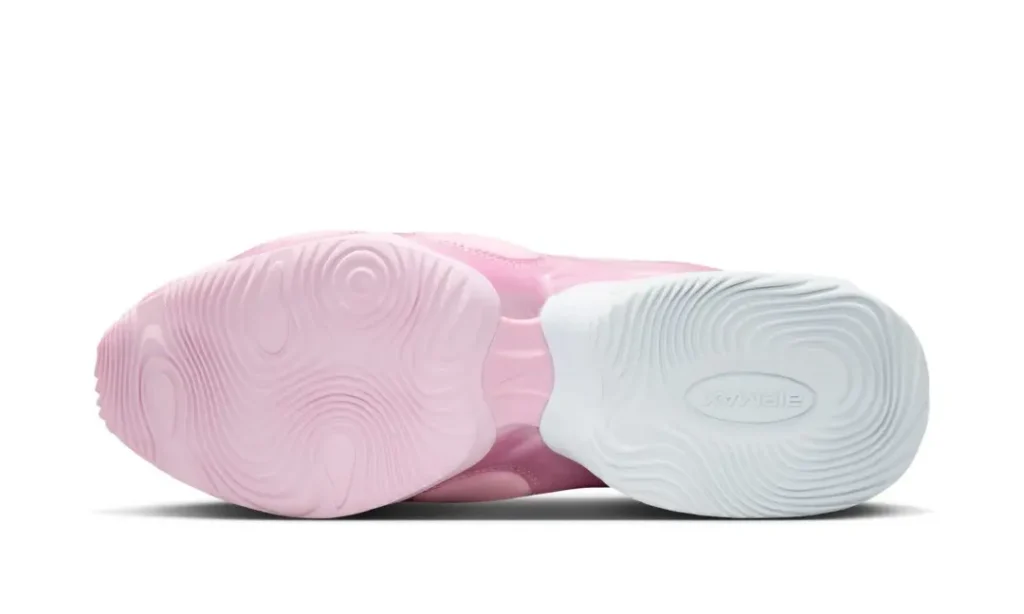 Bottom view of the Nike Air Max Muse display the dual-tone pink and white outsole with concentric traction groove