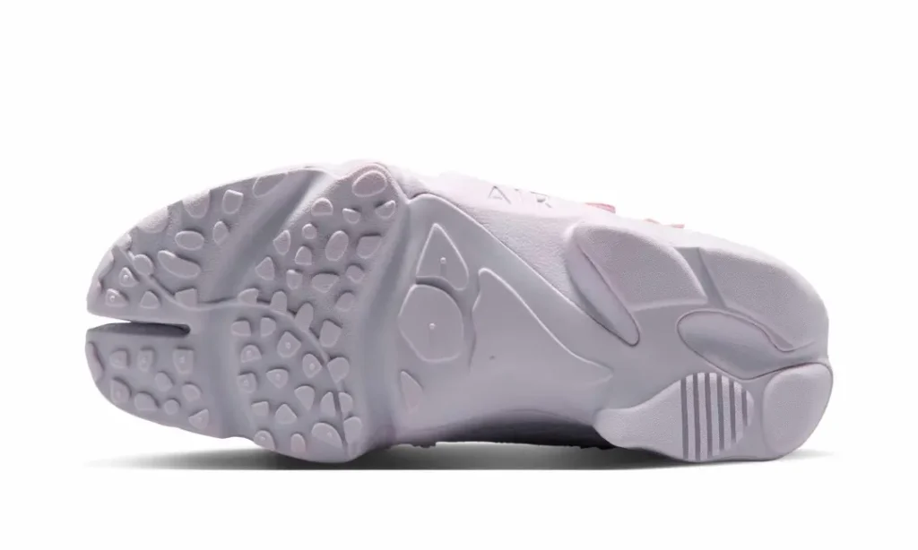 Bottom view of the Nike Air Rift displaying the split forefoot outsole, textured traction pods, and lightweight cushion design