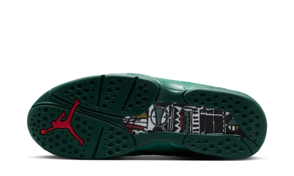 Outsole of the Air Jordan 8 x SoleFly shoe featuring a dark green rubber tread, red Jumpman logo, and colorful illustrated midfoot shank graphic