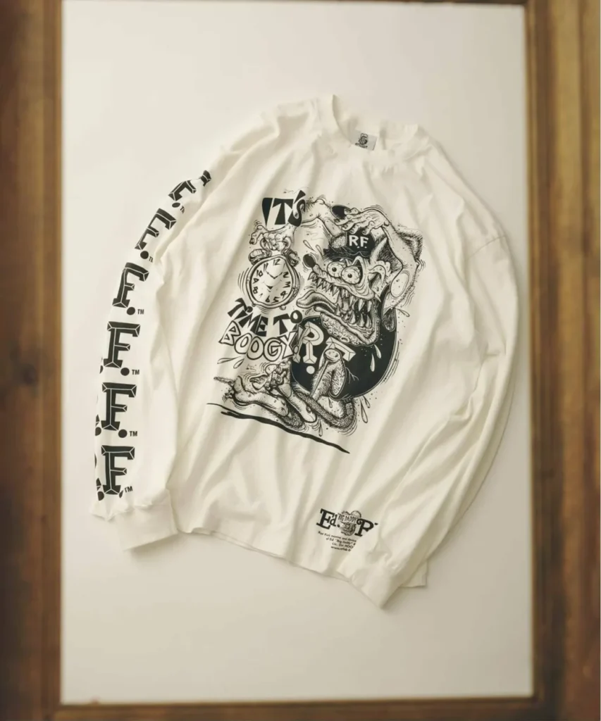 Off white long sleeve Tee on display, screen printed with Rat Fink wearing an "RF" cap beside a melting pocket watch, "It's Time to Boogy" text, and an "Ed Big Daddy Roth" logo near the hem